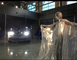 "Emily" or the Flying Lady is the venerable hood ornament for Rolls-Royce automobiles. The live actress seen here on the right captured the mystery and drama behind the creation of the emblem.