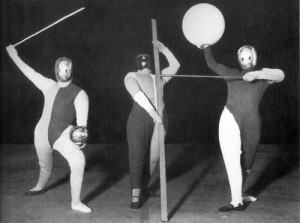 Fooled you- this still from one of Oskar Schlemmer's Bauhaus costume parties is from the 1920's. Dadaism was influencing progressive art circles and wearable art made an impact. 