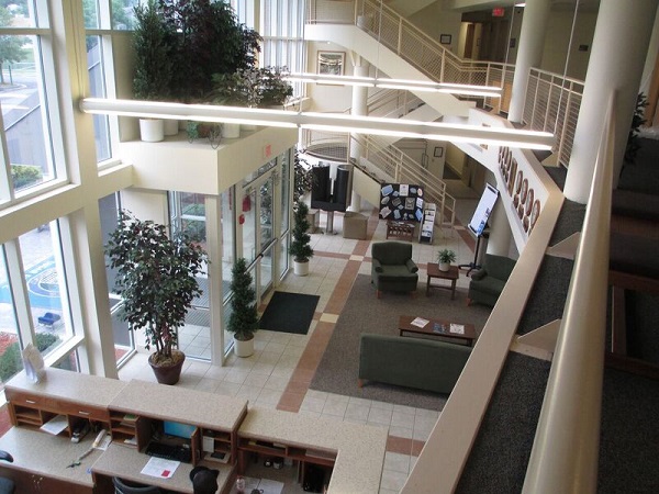 Interior of dorm housing unit. Note the security desk.