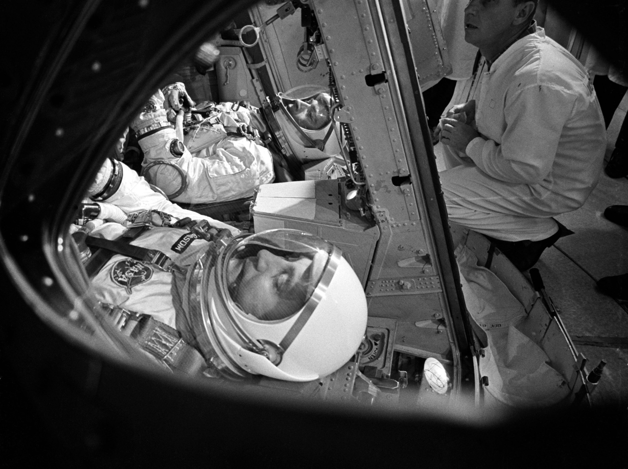 Grissom and Young inside the Gemini III spacecraft